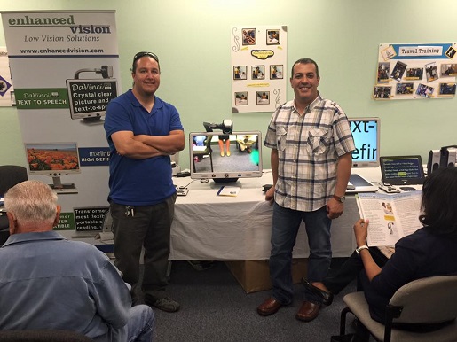Low vision gadgets and talking technology:
 George and Jesus from Ovac Assistive Technology Inc. demonstrating enhanced vision products