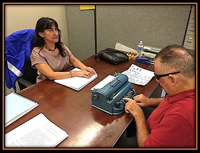 Braille instructor with her student.