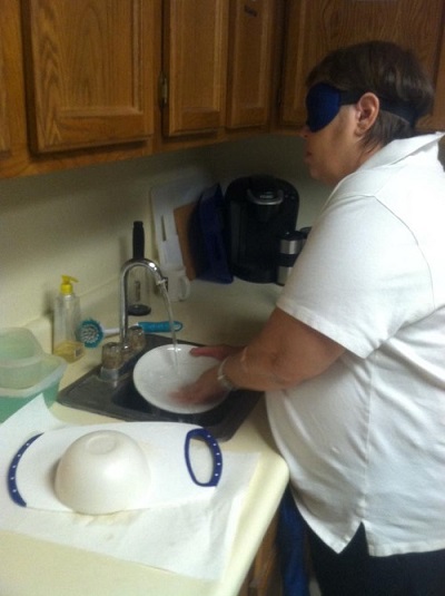 learning how to wash dishes before going blind