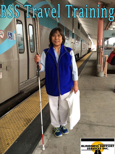 Yvonne at the Train Station for her training by Blindness Support Services