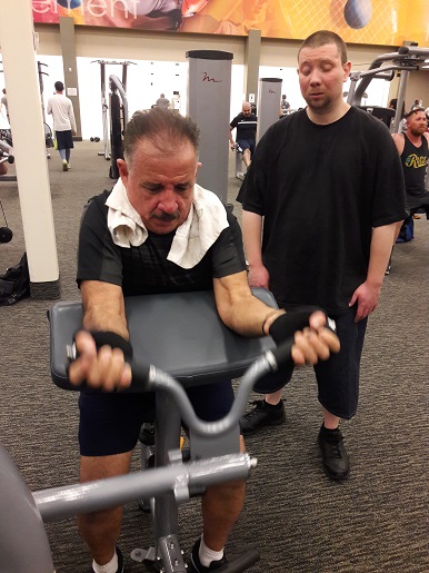 Sal is working his arms at LA Fitness